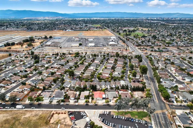an aerial view of a city with lots of residential buildings