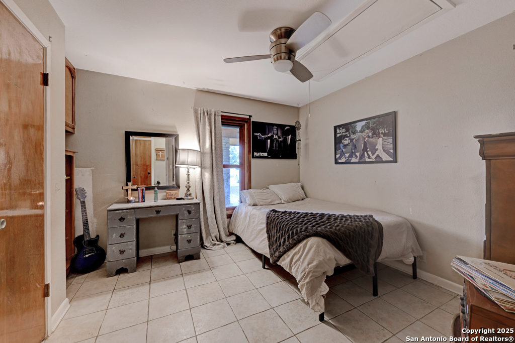 3136 Bolton Road Marion, TX 78124 - Photo 18 of 46 a living room with furniture and a flat screen tv