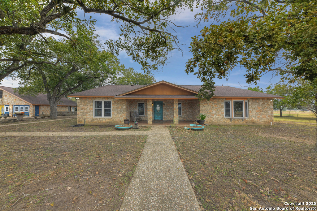 3136 Bolton Road Marion, TX 78124 - Photo 2 of 46 a front view of a house with yard