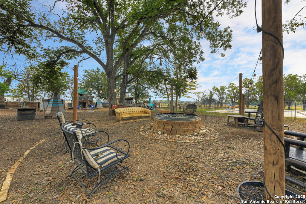 3136 Bolton Road Marion, TX 78124 - Photo 22 of 46 a view of a backyard with sitting area