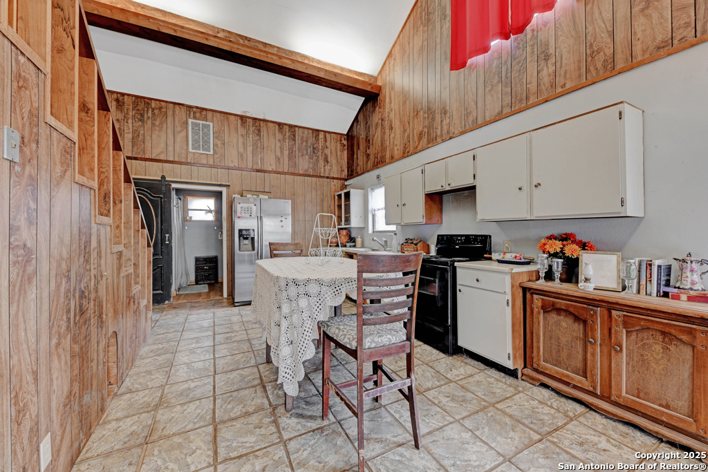 3136 Bolton Road Marion, TX 78124 - Photo 28 of 46 a kitchen with cabinets and chairs