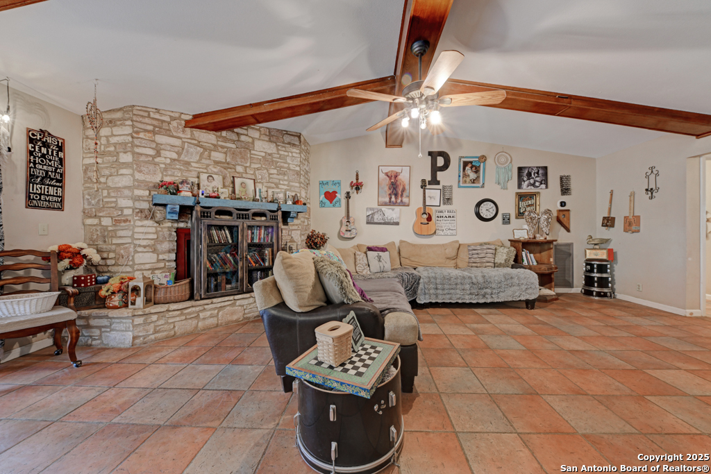 3136 Bolton Road Marion, TX 78124 - Photo 4 of 46 a view of a livingroom with furniture and a ceiling fan
