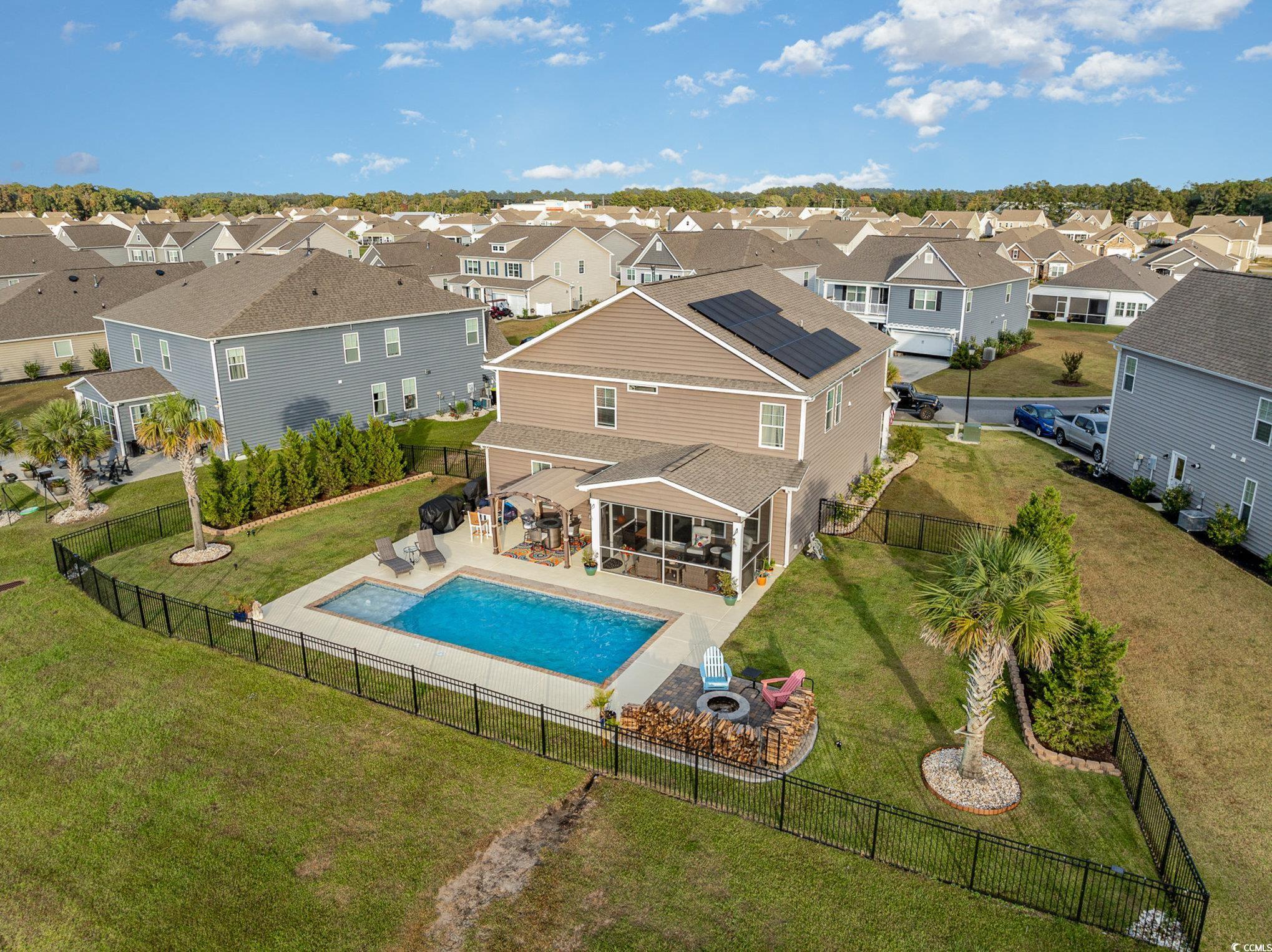 5247 Stockyard Loop Myrtle Beach, SC 29588 - Photo 3 of 39 View of swimming pool with a patio and a lawn