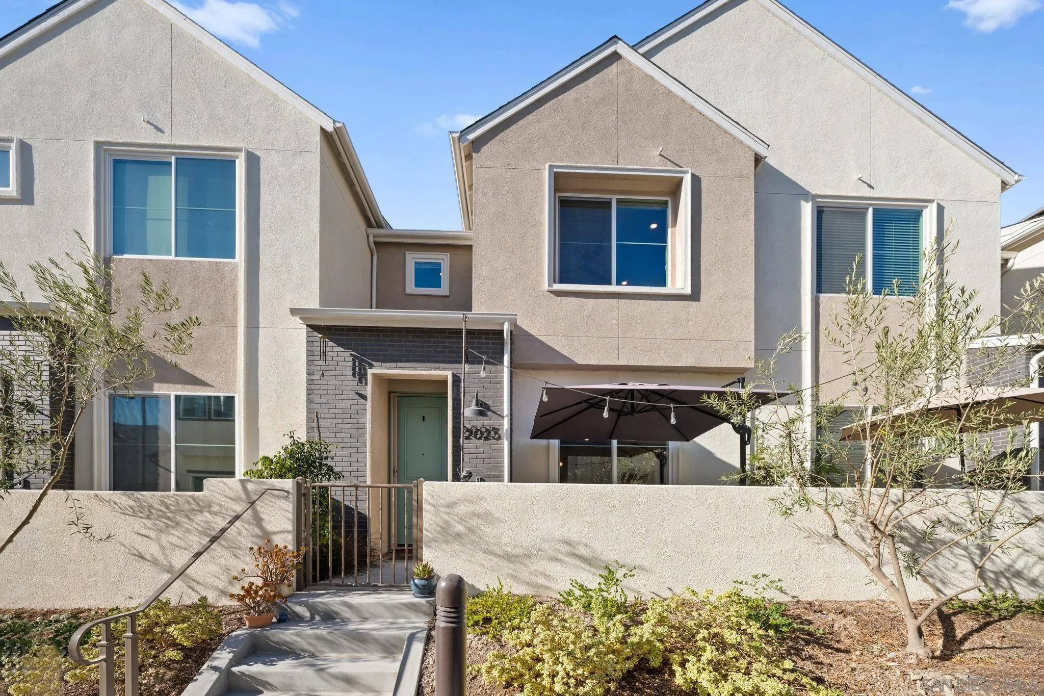 2023 Bluestone Circle Chula Vista, CA 91913 - Photo 2 of 51 a view of a house with a snow in the background