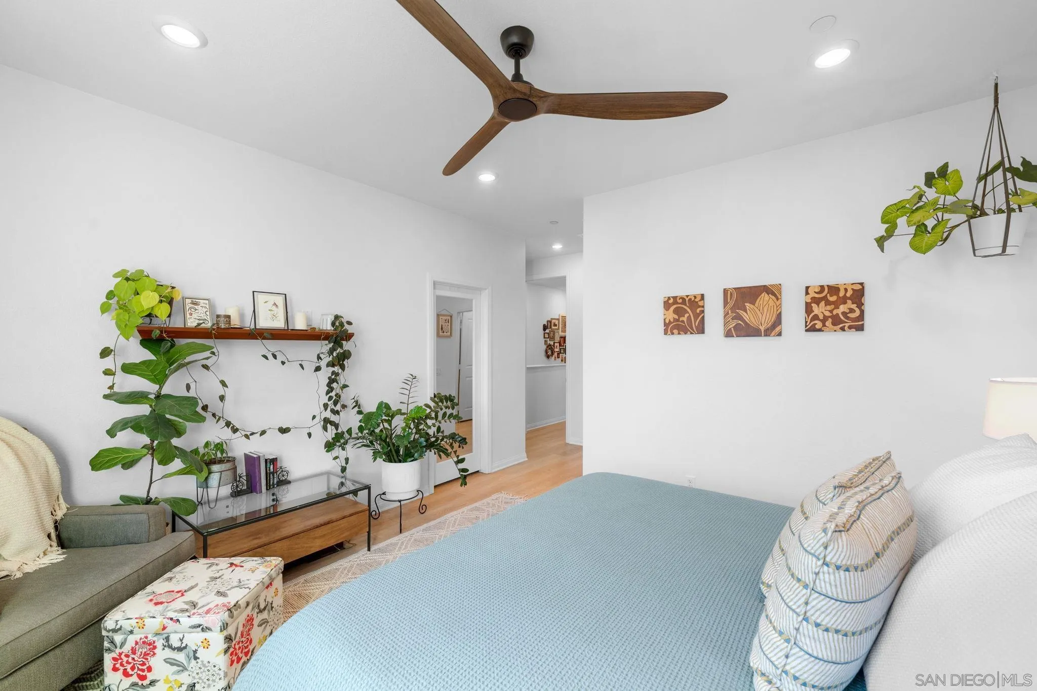 2023 Bluestone Circle Chula Vista, CA 91913 - Photo 24 of 51 a living room with furniture and flowers