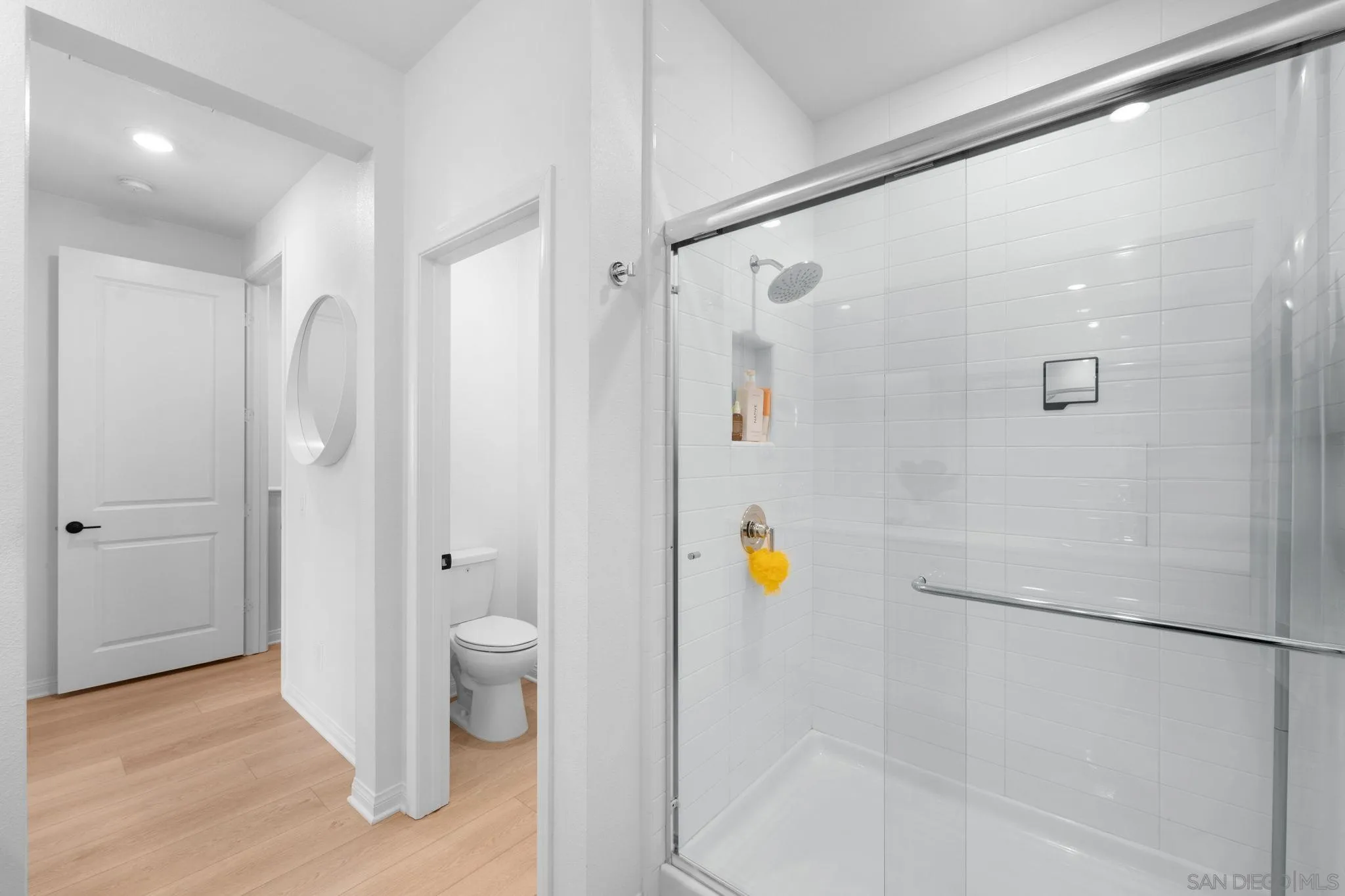 2023 Bluestone Circle Chula Vista, CA 91913 - Photo 32 of 51 a bathroom with a shower and a toilet