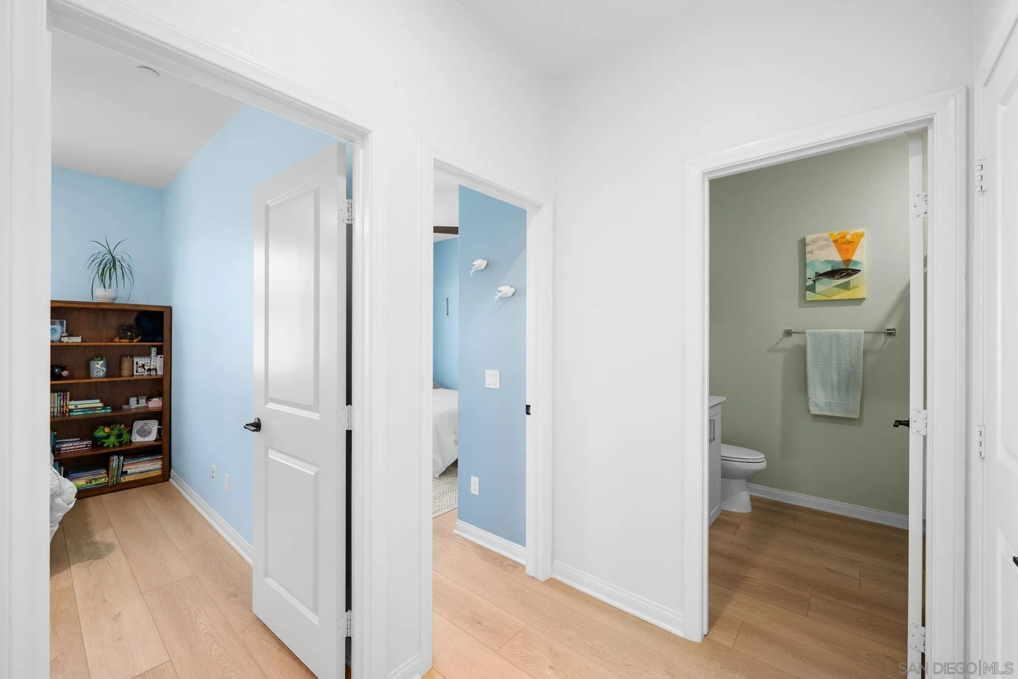 2023 Bluestone Circle Chula Vista, CA 91913 - Photo 37 of 51 a view of a hallway with wooden floor and closet