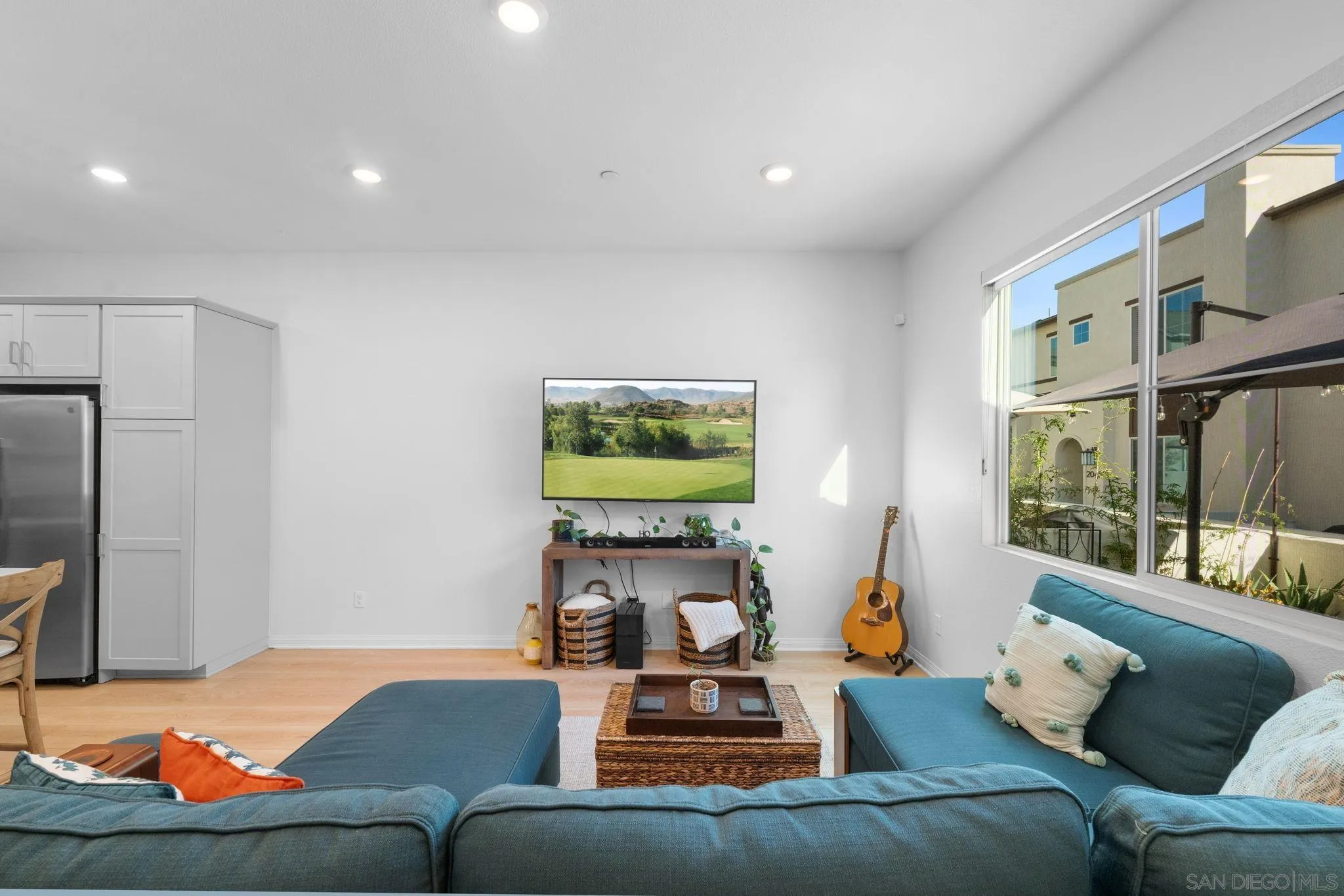 2023 Bluestone Circle Chula Vista, CA 91913 - Photo 9 of 51 a living room with furniture and a flat screen tv