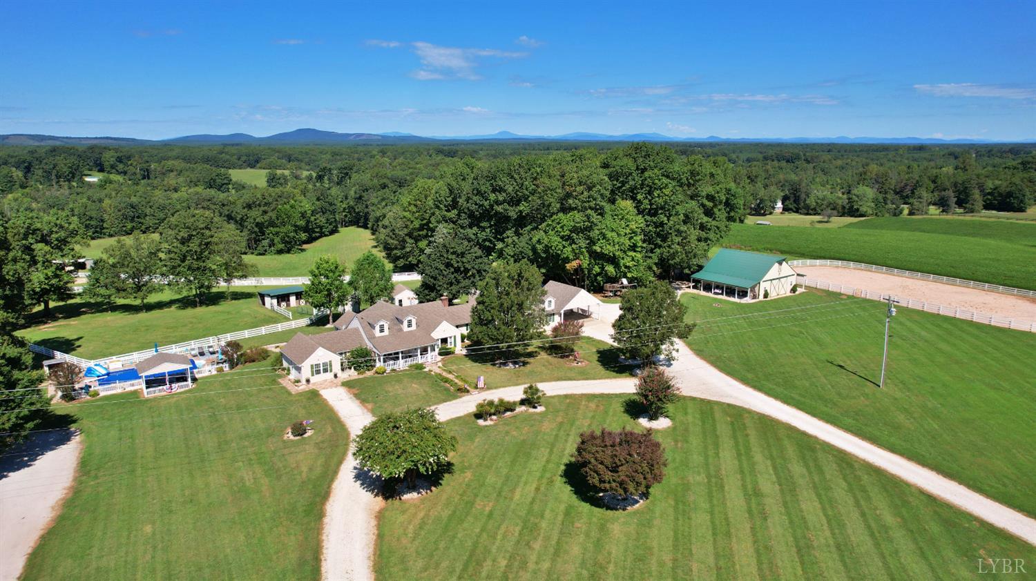 a view of a golf course with chairs