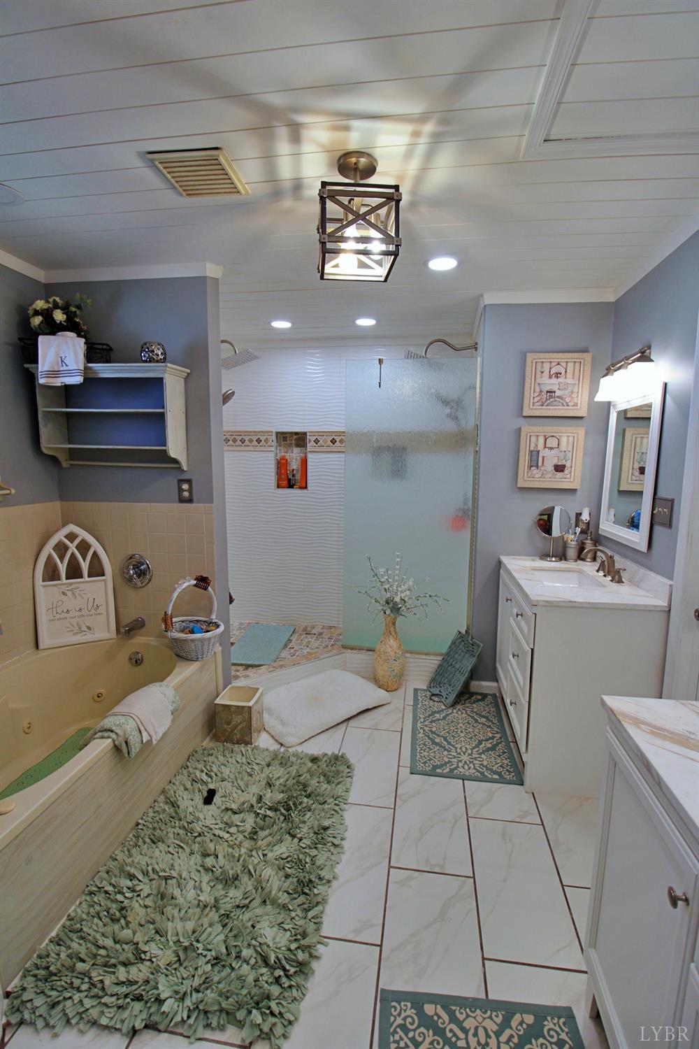 1147 Union Church Road Gladstone, VA 24553 - Photo 19 of 89 a bathroom with a sink toilet and a mirror