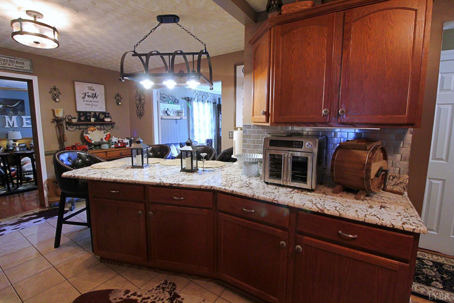 1147 Union Church Road Gladstone, VA 24553 - Photo 25 of 89 a kitchen with a sink cabinets and window
