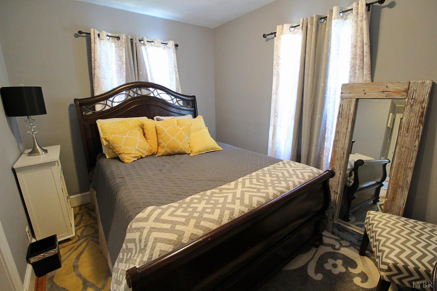 1147 Union Church Road Gladstone, VA 24553 - Photo 36 of 89 a bedroom with a bed and wooden floor