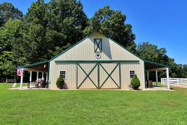 a view of a house with backyard porch and patio