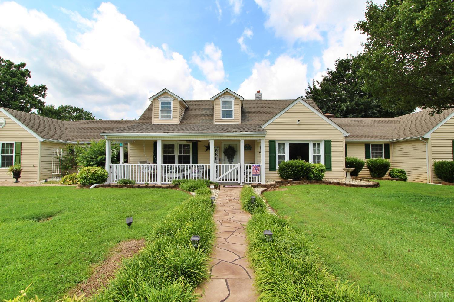 1147 Union Church Road Gladstone, VA 24553 - Photo 62 of 89 a front view of a house with garden and porch