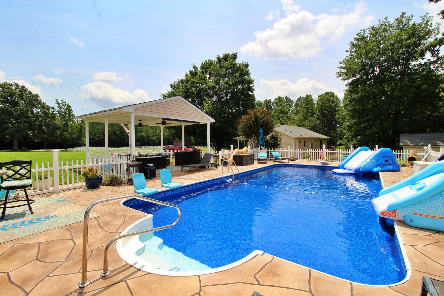 1147 Union Church Road Gladstone, VA 24553 - Photo 68 of 89 a view of a swimming pool with lounge chairs in patio