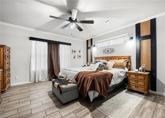 a bathroom with a tub a sink a mirror and a shower