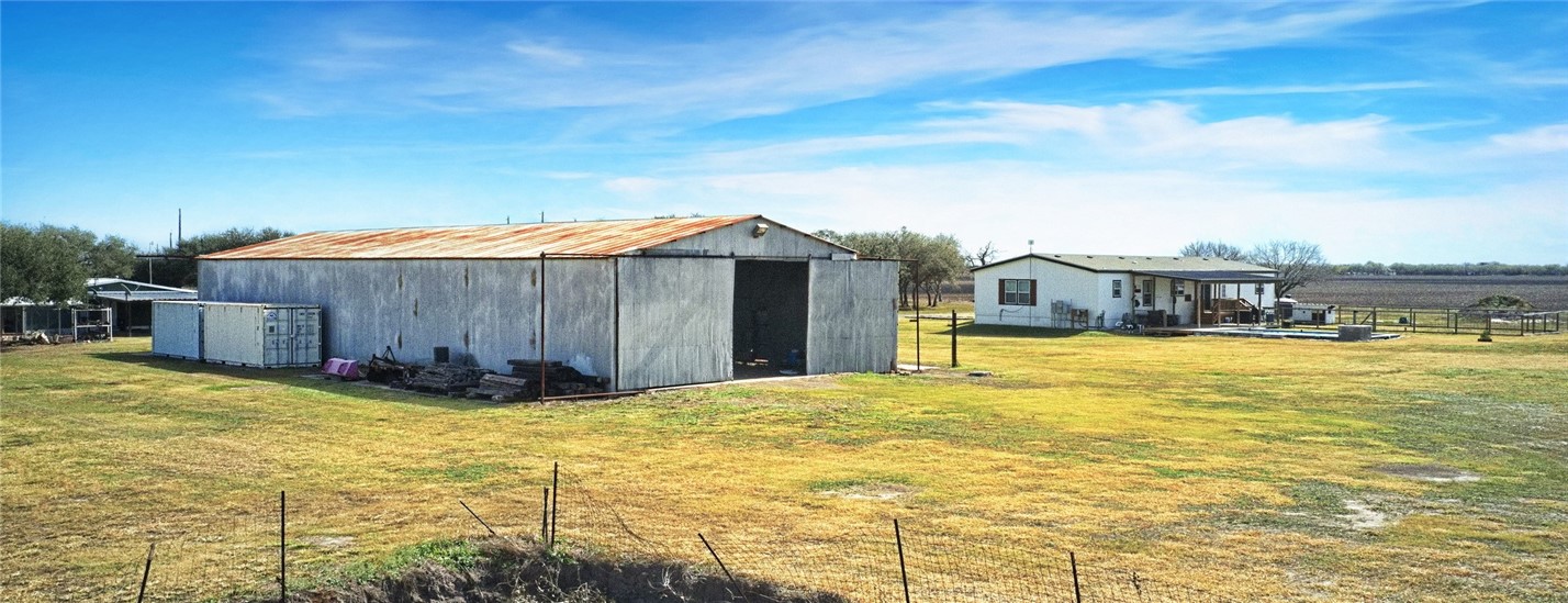 7017 County Road 2253 Odem, TX 78370 - Photo 31 of 40 a view of a large pool with an outdoor space