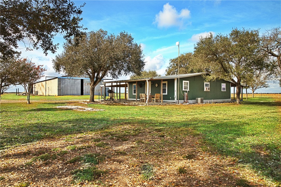 7017 County Road 2253 Odem, TX 78370 - Photo 34 of 40 a view of a house with a big yard