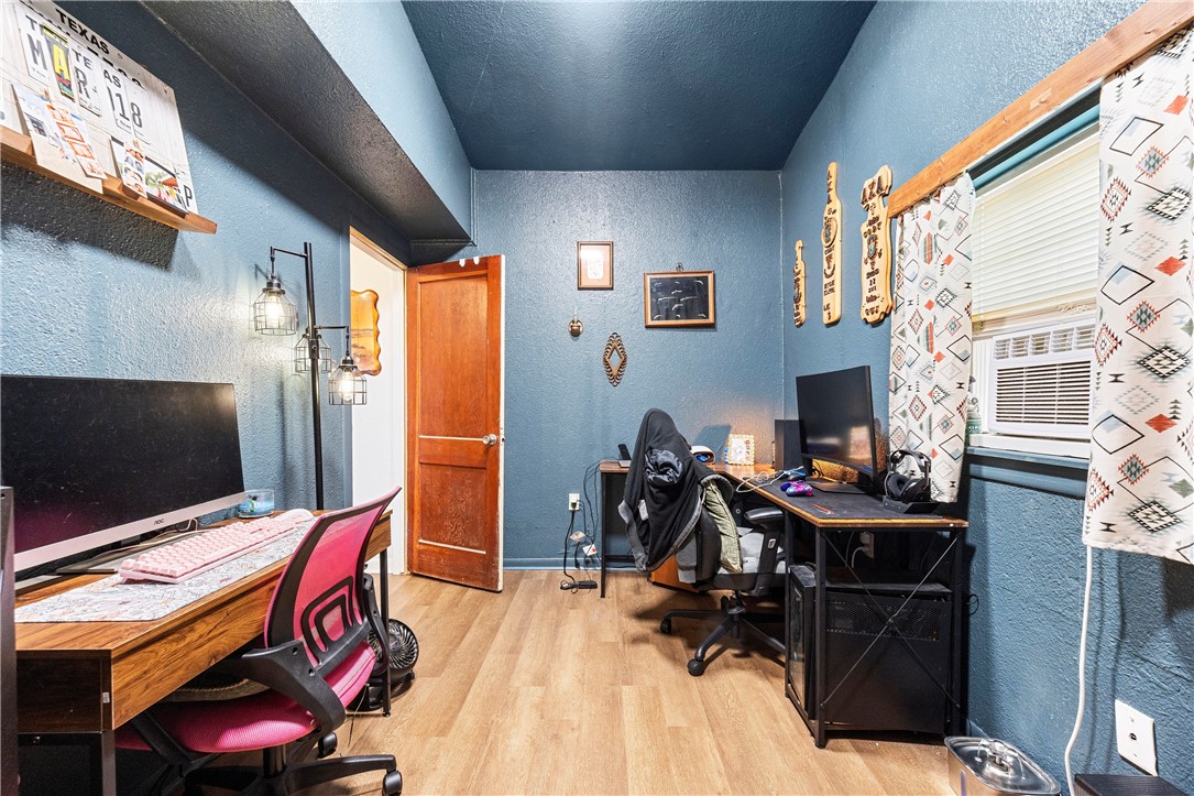 7017 County Road 2253 Odem, TX 78370 - Photo 40 of 40 a bedroom with a bed and a flat screen tv