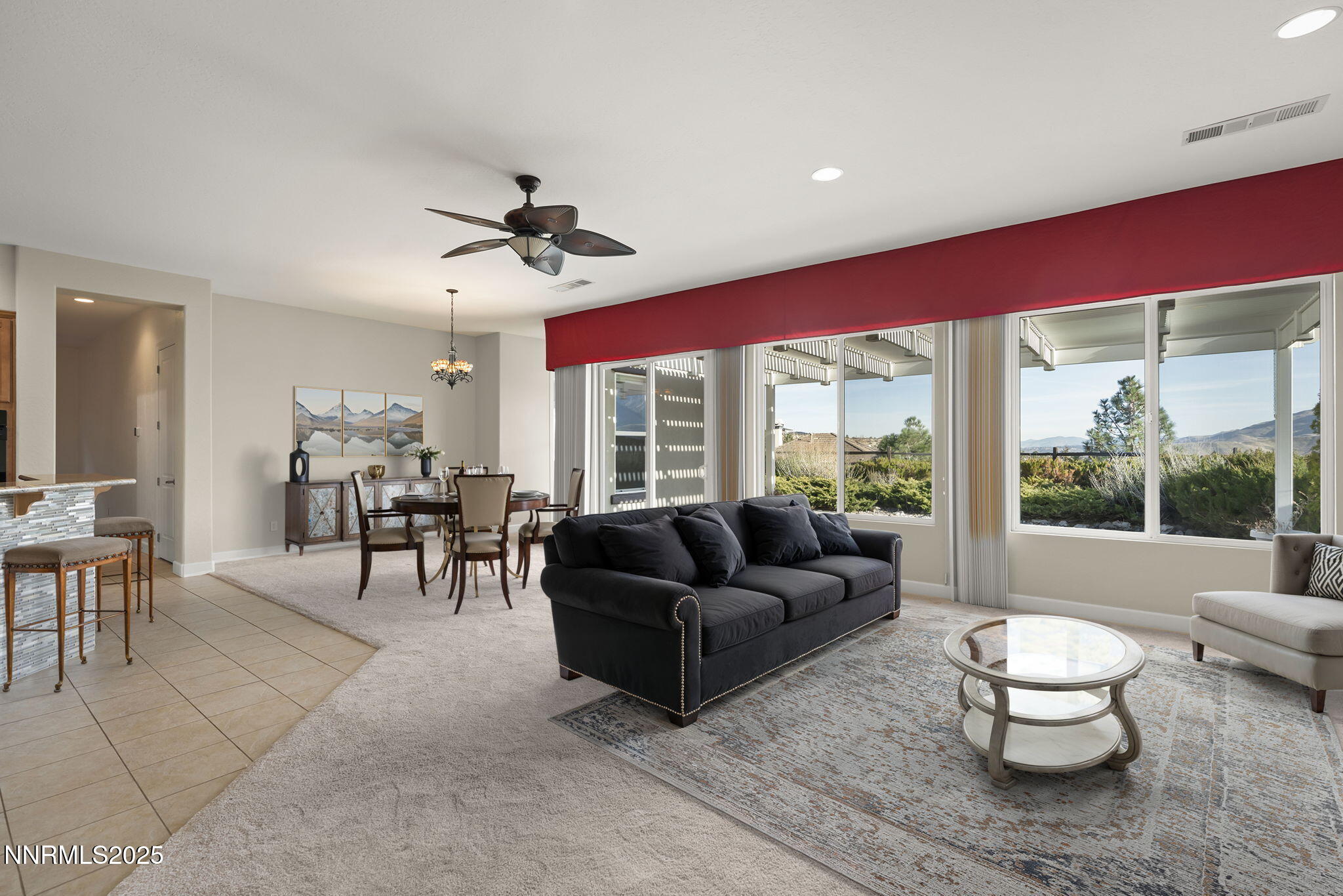 9190 Quilberry Way Reno, NV 89523 - Photo 14 of 39 a living room with furniture and a large window