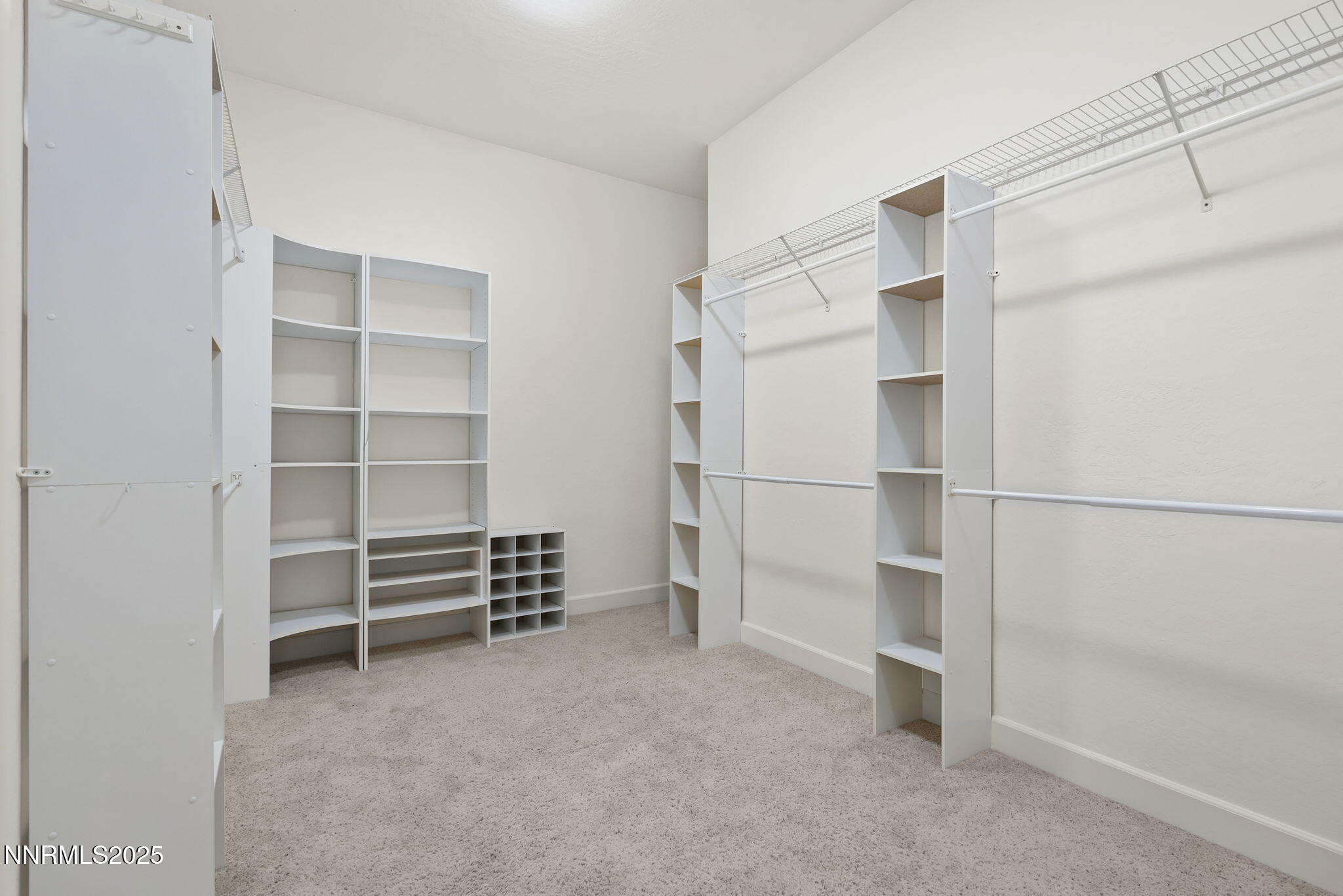 9190 Quilberry Way Reno, NV 89523 - Photo 27 of 39 a view of walk in closet with empty racks