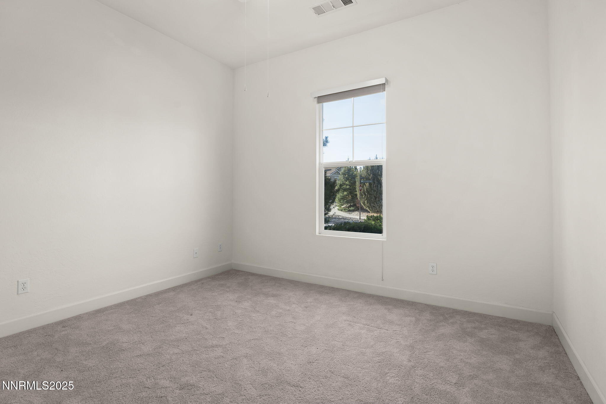 9190 Quilberry Way Reno, NV 89523 - Photo 29 of 39 an empty room with a window
