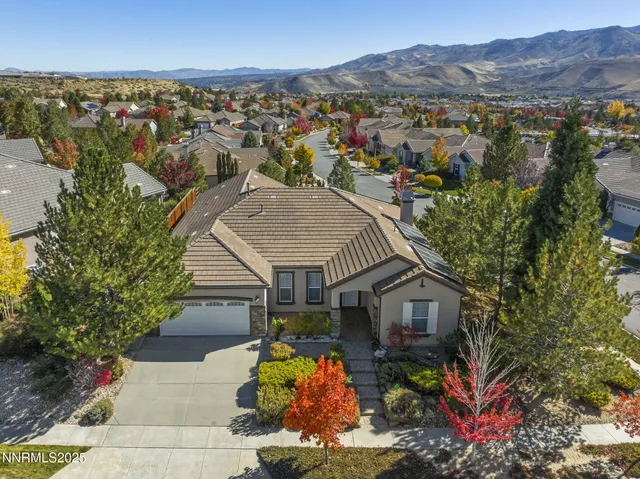 an aerial view of a house with a garden