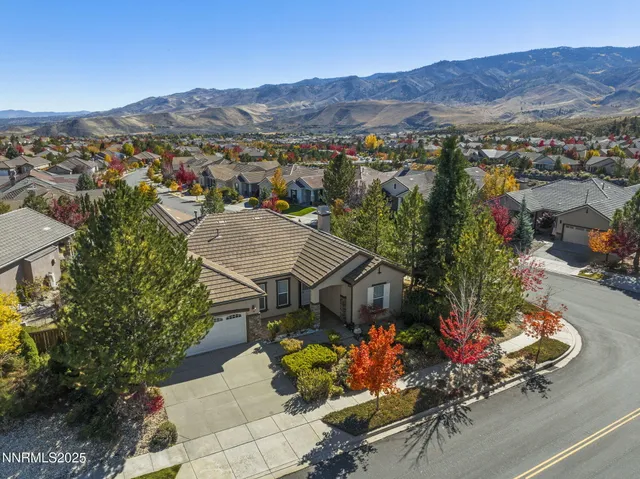 an aerial view of a house with a garden