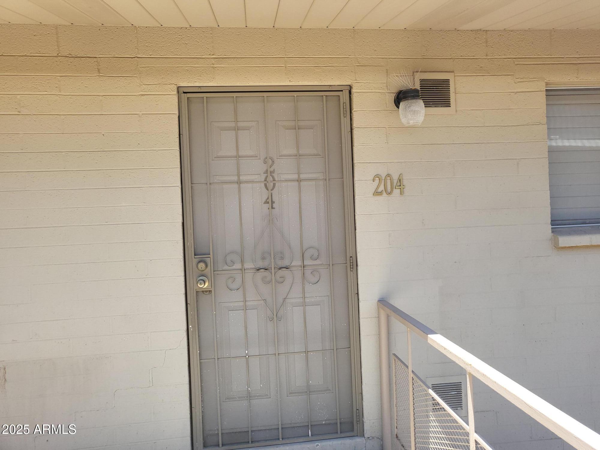 815 North Hayden Road, Unit A204 Scottsdale, AZ 85257 - Photo 16 of 27 a bathroom with a shower