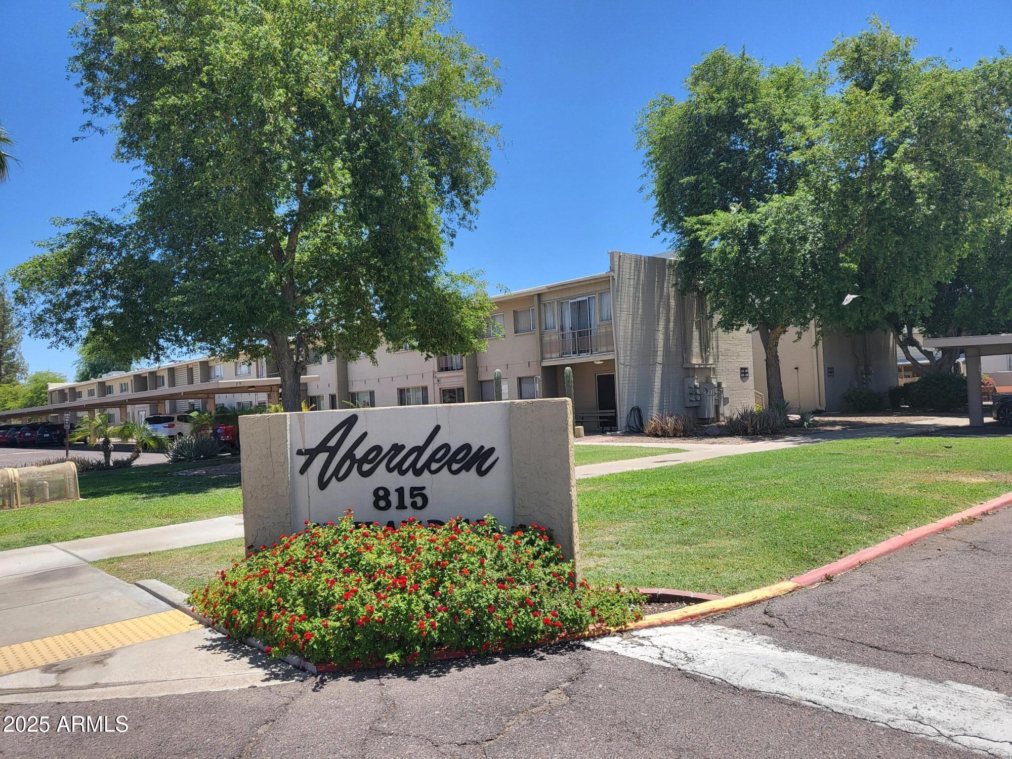 815 North Hayden Road, Unit A204 Scottsdale, AZ 85257 - Photo 17 of 27 a sign on the side of the road