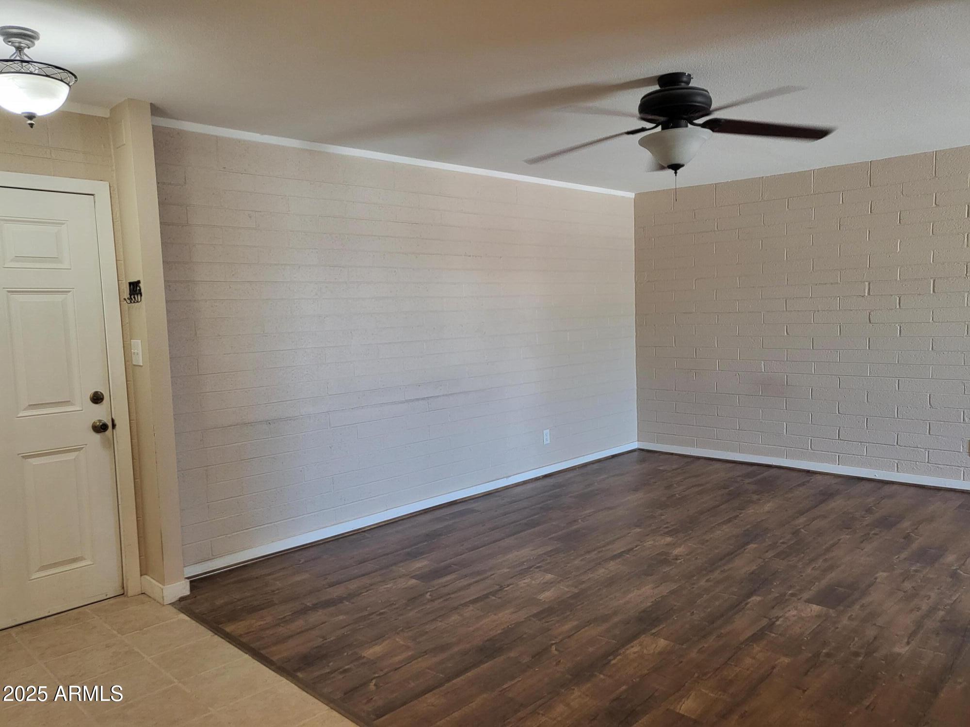 815 North Hayden Road, Unit A204 Scottsdale, AZ 85257 - Photo 2 of 27 wooden floor in an empty room