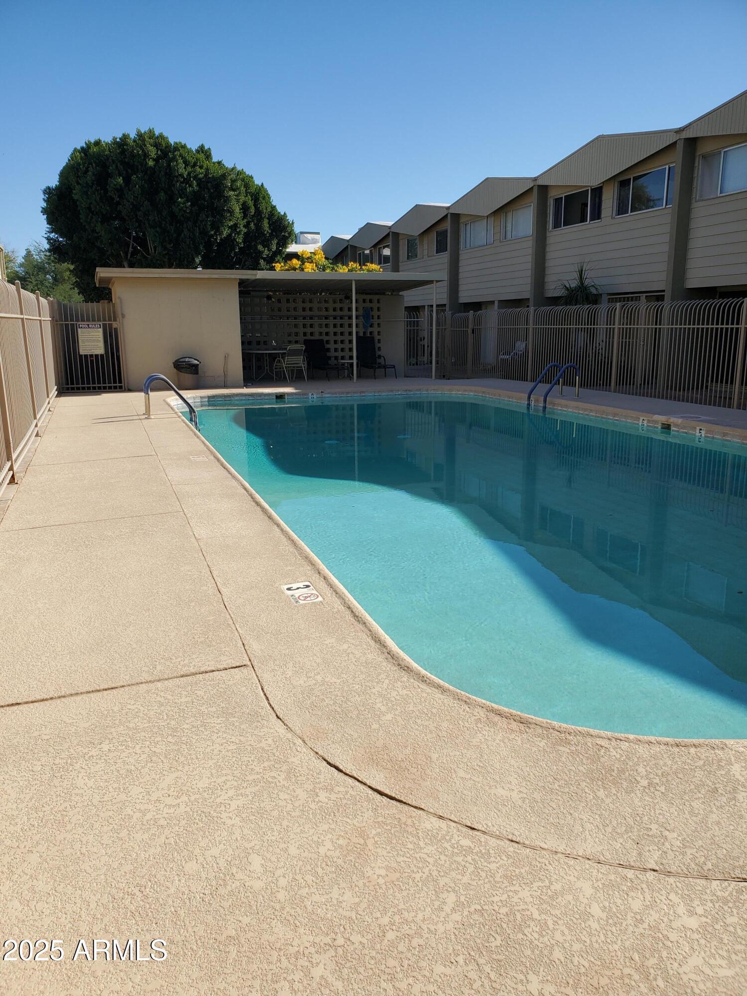815 North Hayden Road, Unit A204 Scottsdale, AZ 85257 - Photo 27 of 27 a view of swimming pool with a yard