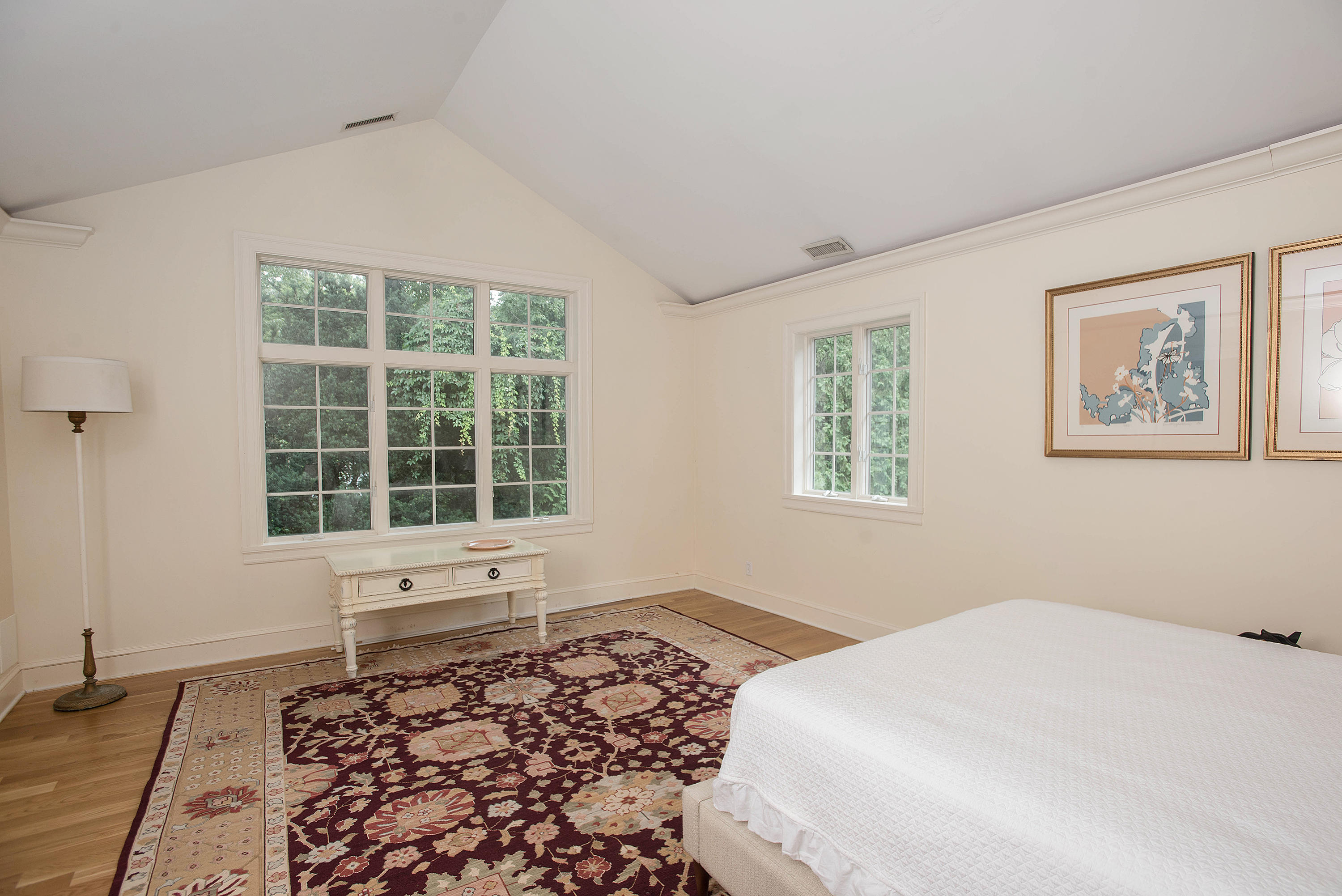 103 Jelliff Mill Road New Canaan, CT 06840 - Photo 16 of 30 a bed sitting in a bedroom next to a window
