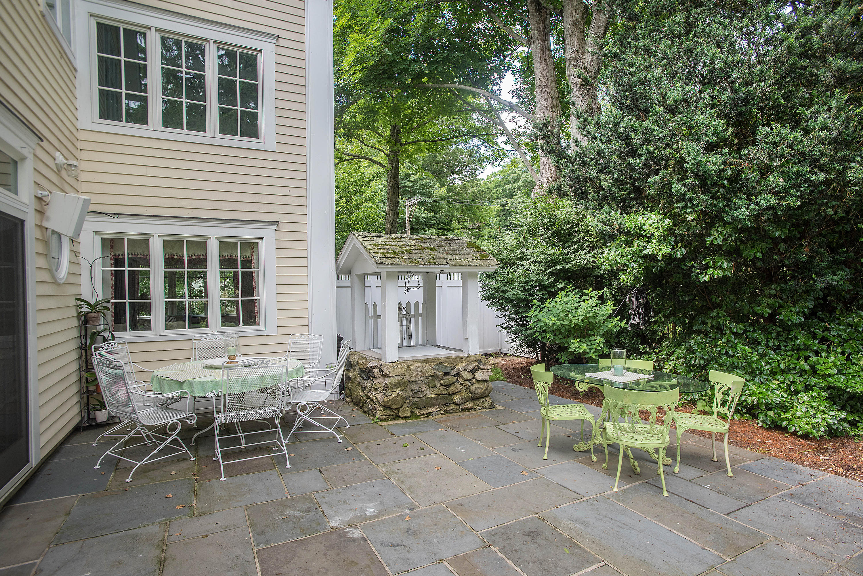 103 Jelliff Mill Road New Canaan, CT 06840 - Photo 24 of 30 a view of a two chairs in a patio