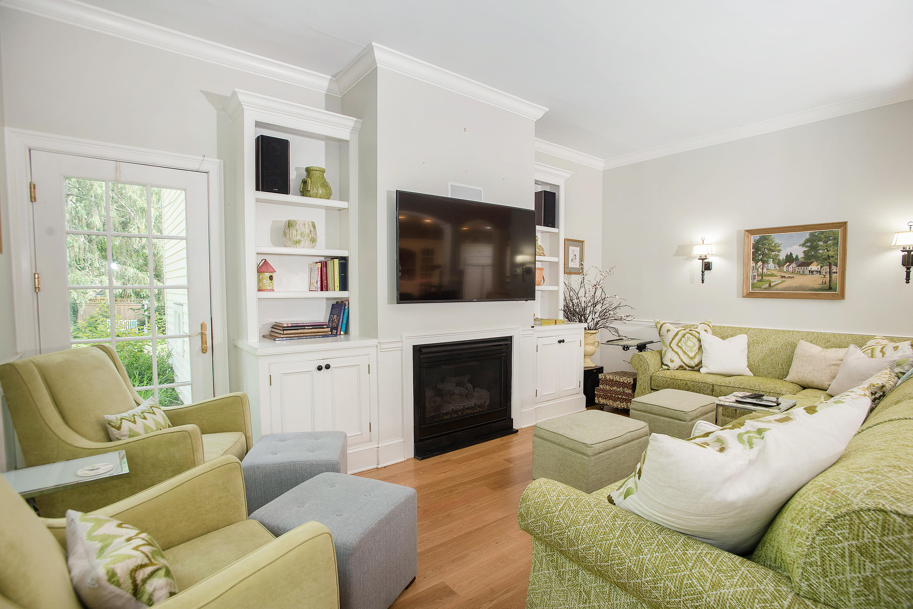 103 Jelliff Mill Road New Canaan, CT 06840 - Photo 9 of 30 a living room with furniture a fireplace and a flat screen tv