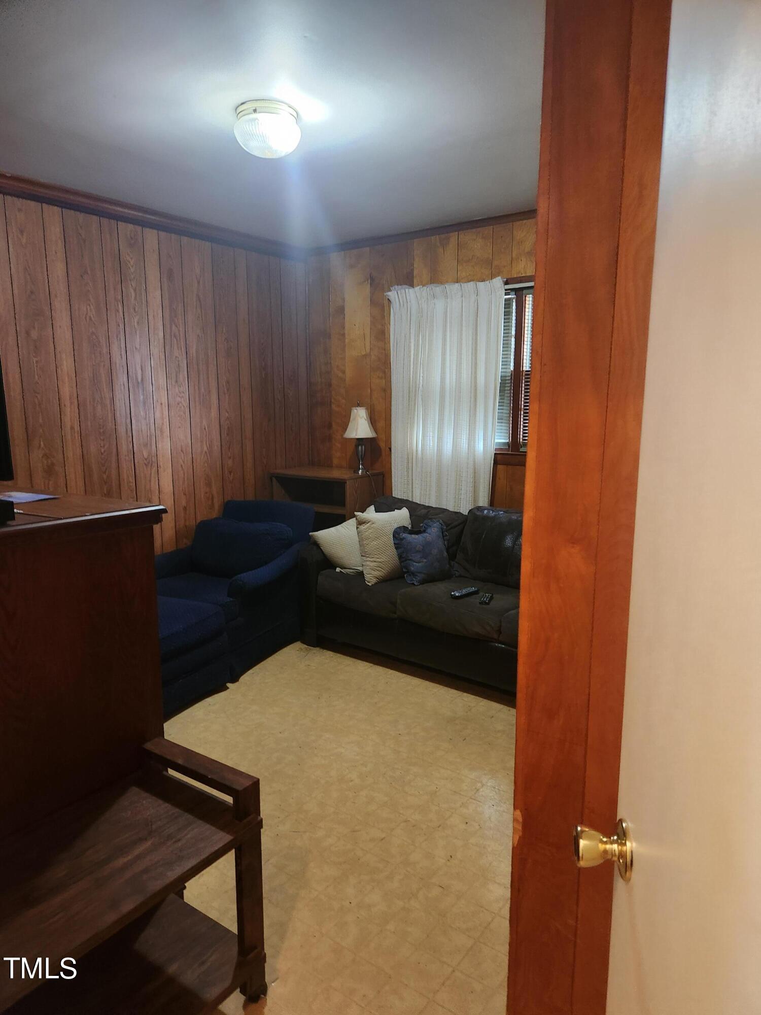 704 Donnelly Road Raleigh, NC 27610 - Photo 19 of 26 a kitchen with a table and chairs in it