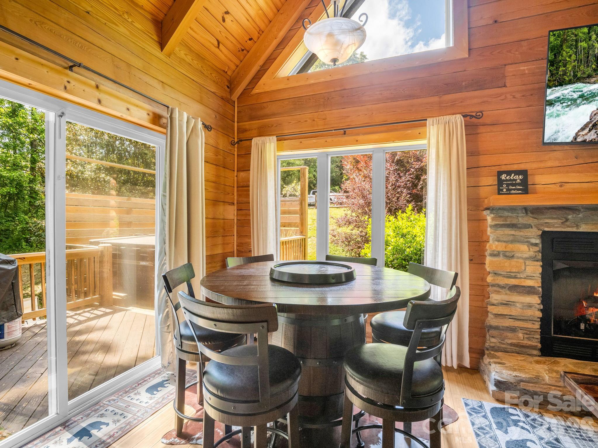165 Dream Road Hendersonville, NC 28792 - Photo 12 of 46 a dining room with furniture and window