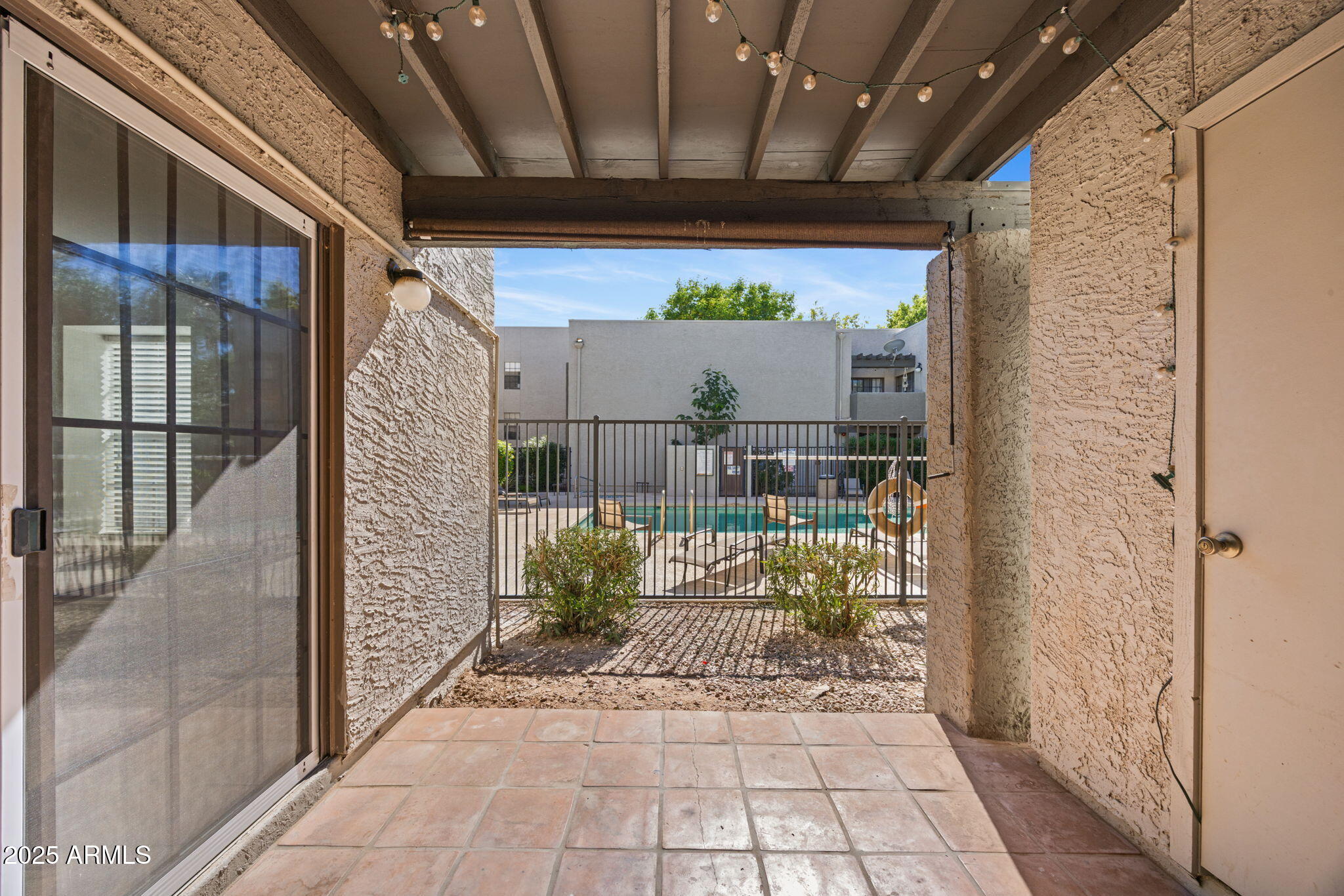 8020 East Thomas Road, Unit 112 Scottsdale, AZ 85251 - Photo 10 of 24 Sunny Patio with Pool Views