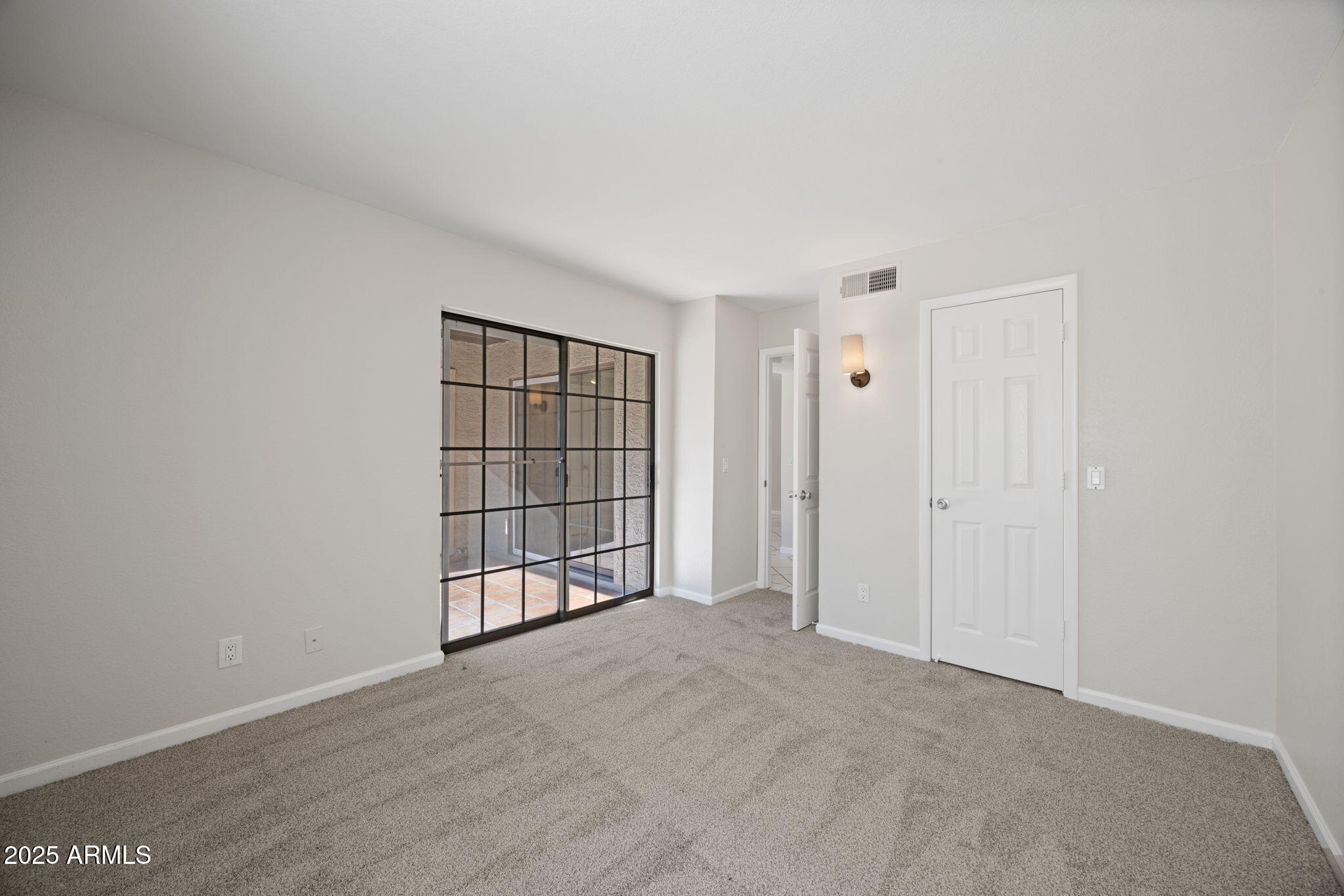 8020 East Thomas Road, Unit 112 Scottsdale, AZ 85251 - Photo 14 of 24 Bedroom View to Patio and Closet