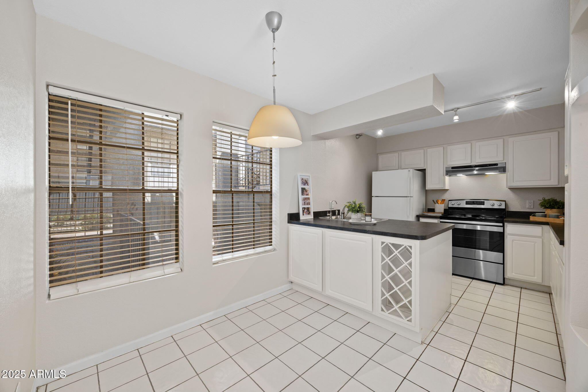 8020 East Thomas Road, Unit 112 Scottsdale, AZ 85251 - Photo 7 of 24 Open Plan Kitchen