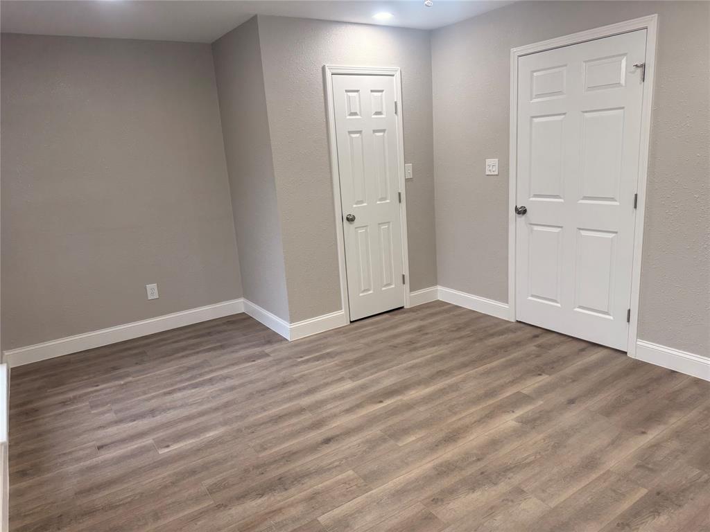 112 Myrtle Drive New Boston, TX 75570 - Photo 6 of 31 a view of empty room with wooden floor