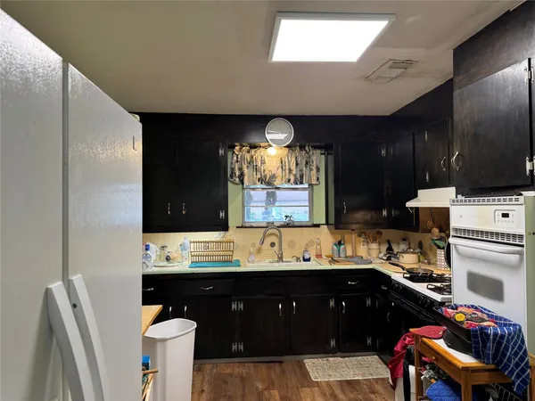 a bathroom with a sink double vanity and a mirror