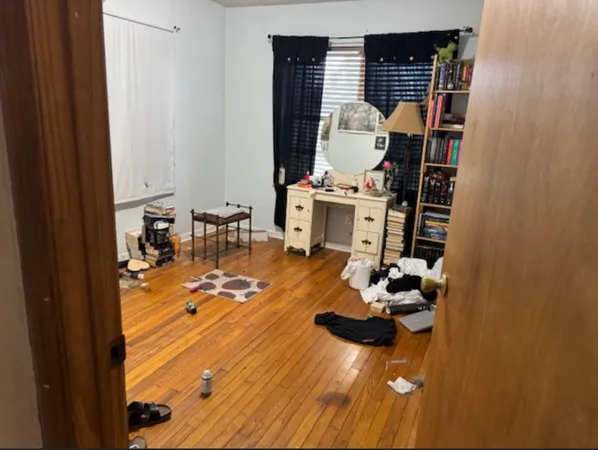 a room with furniture and gym equipment