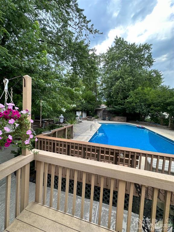 13 Parsons Road East Brunswick, NJ 08816 - Photo 14 of 39 a view of city from a balcony