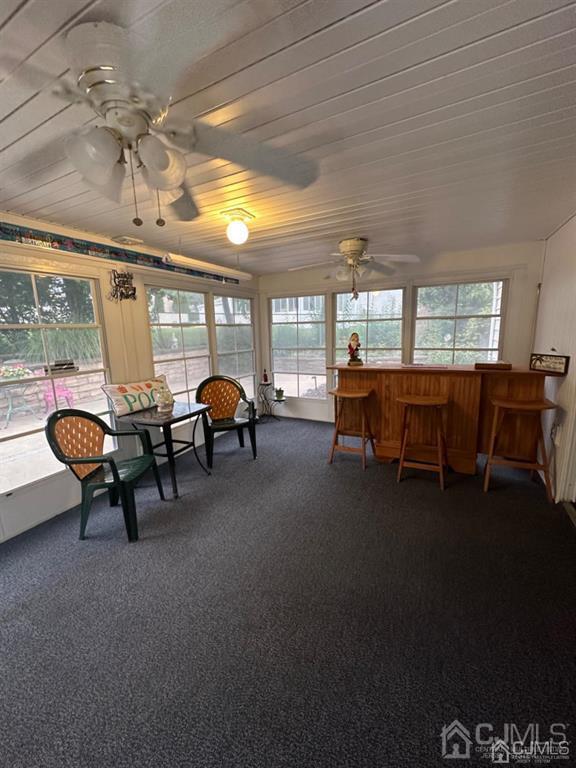 13 Parsons Road East Brunswick, NJ 08816 - Photo 21 of 39 a living room with furniture and a table