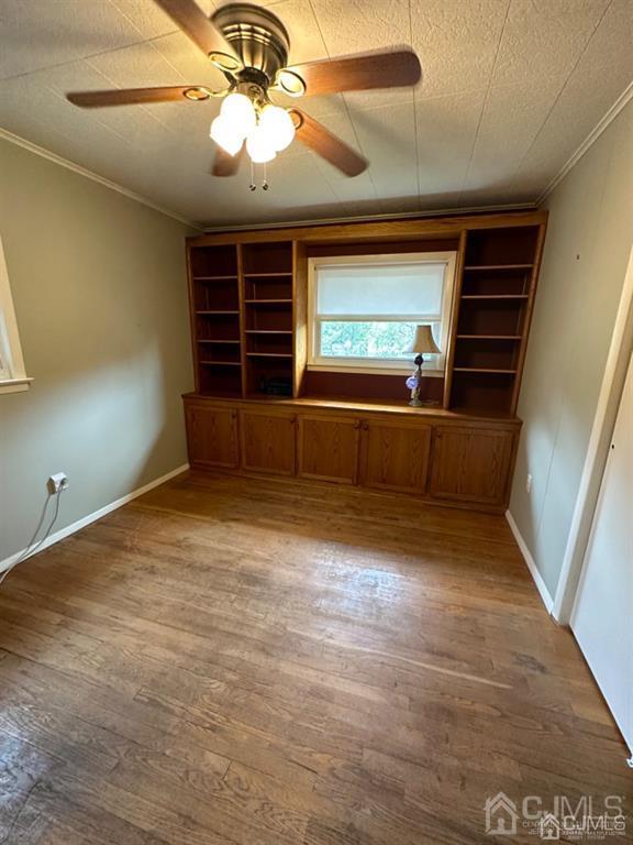 13 Parsons Road East Brunswick, NJ 08816 - Photo 24 of 39 wooden floor in an empty room with a window