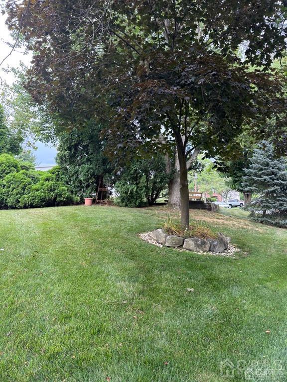 13 Parsons Road East Brunswick, NJ 08816 - Photo 28 of 39 a view of green field with trees