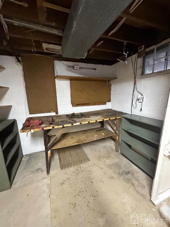 13 Parsons Road East Brunswick, NJ 08816 - Photo 35 of 39 a view of an empty room with wooden floor