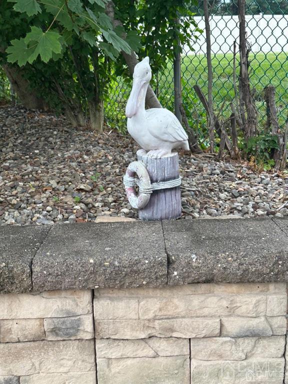13 Parsons Road East Brunswick, NJ 08816 - Photo 38 of 39 a table and chairs in a yard