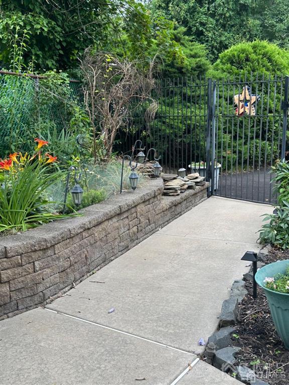 13 Parsons Road East Brunswick, NJ 08816 - Photo 5 of 39 a view of backyard with swimming pool and sitting area